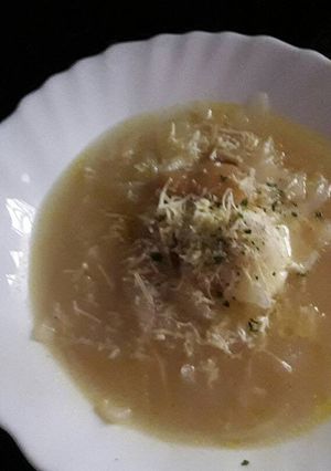 A picture of Onion Soup with Cheese and Hard-Boiled Egg.