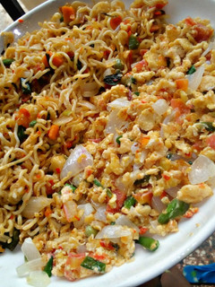 A picture of Fried indomie with scrambled eggs (pls my people I need a job).