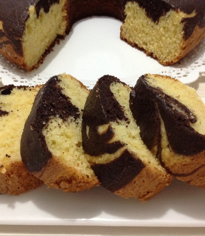 Una foto de Budín marmolado de naranja y chocolate