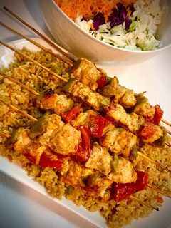 صورة لوصفة شيش طاوق على رز متبل