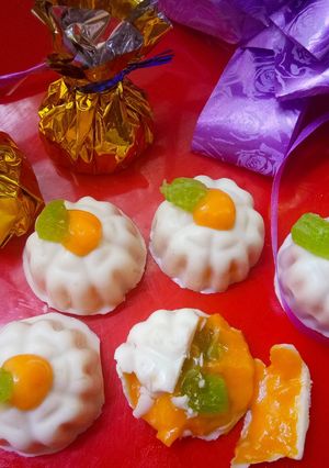 A picture of Raw mango candy and Aamrakhand filled Chocolates.