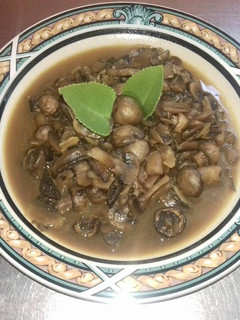 Una foto de Hongos con mantequilla y ajo