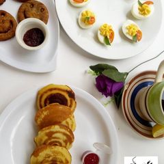 A picture of Devilled eggs, Japanese Pancakes, Smiley potato Pakora.