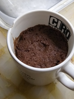 Una foto de Bizcochuelo en taza tipo brownie (mug cake)