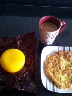 A picture of Perfect toast & omlet/scrambled eggs.
