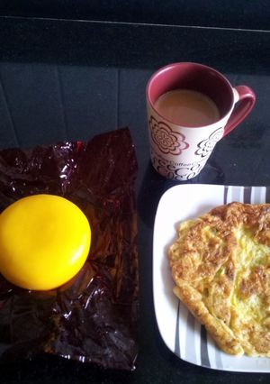A picture of Perfect toast & omlet/scrambled eggs.