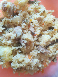 Una foto de Cuscús con verduras y piñones