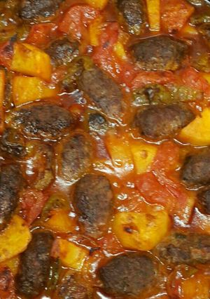 A picture of Kofta Casserole with Potatoes in Tomato Sauce.