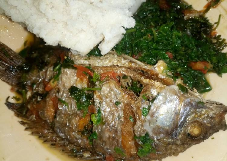 Fish stew, spinach and ugali