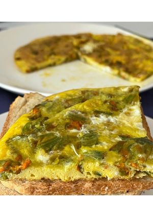 A picture of Frittata with Zucchini Blossoms🥚🥒.