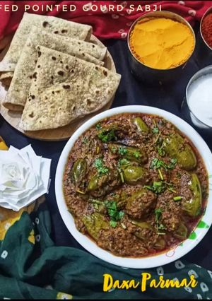 A picture of Shahi Stuffed Pointed Gourd Sabji (Shahi Bharwa Parwal Sabji).