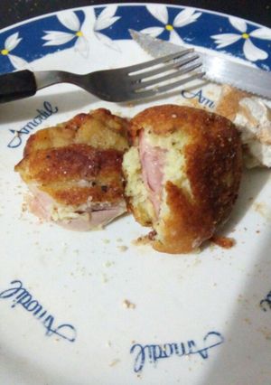 Una foto de Milas de pollo con bombas de papa y batata