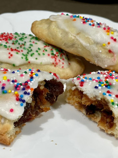 A picture of Cuccidati (Italian Date-Filled Cookies).