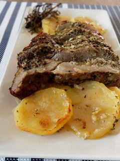 Una foto de Secreto de cerdo al horno con patatas