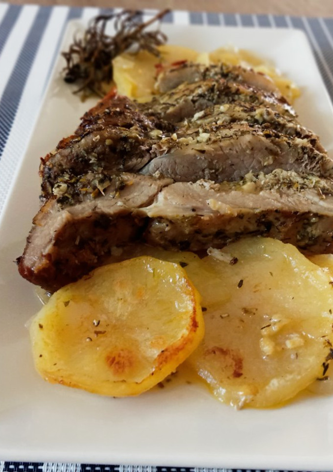 Una foto de Secreto de cerdo al horno con patatas