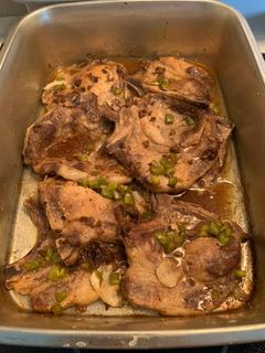 A picture of Baked Pork chops with Gravy.