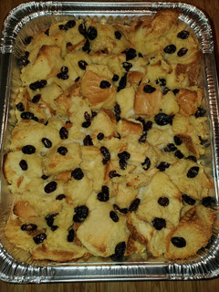 A picture of Classic NOLA Bread Pudding with Bourbon Sauce.