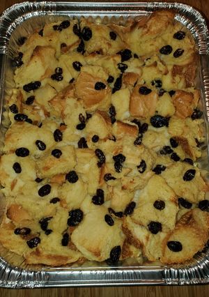 A picture of Classic NOLA Bread Pudding with Bourbon Sauce.