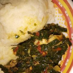 A picture of Efo riro soup with semo.
