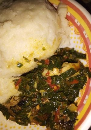 A picture of Efo riro soup with semo.