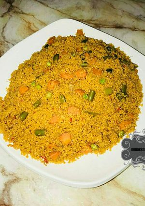 A picture of Jallof cous cous wt vegetables.