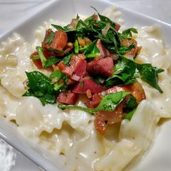 A picture of Parmesan bow-ties with crispy pancetta.