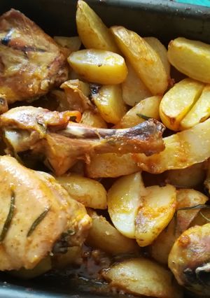 A picture of Chicken with Garlic Sauce, Potatoes, and Rosemary.