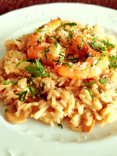 Una foto de El risotto de mi papa (con calamar y gambas)