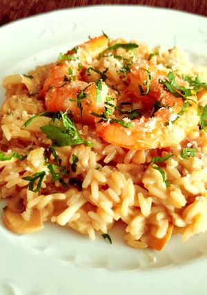 Una foto de El risotto de mi papa (con calamar y gambas)