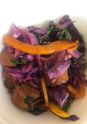 A picture of Sautéed Purple Cabbage & Kale with Hot Italian Vegan Sausage & Bell Peppers.