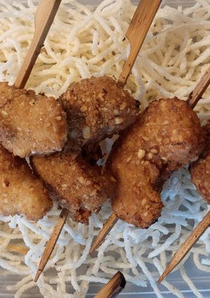 Una foto de Brochette de langostinos