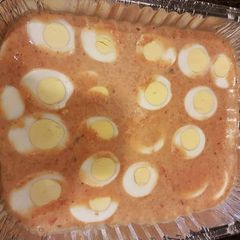 A picture of Moi moi with boiled egg.