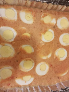 A picture of Moi moi with boiled egg.