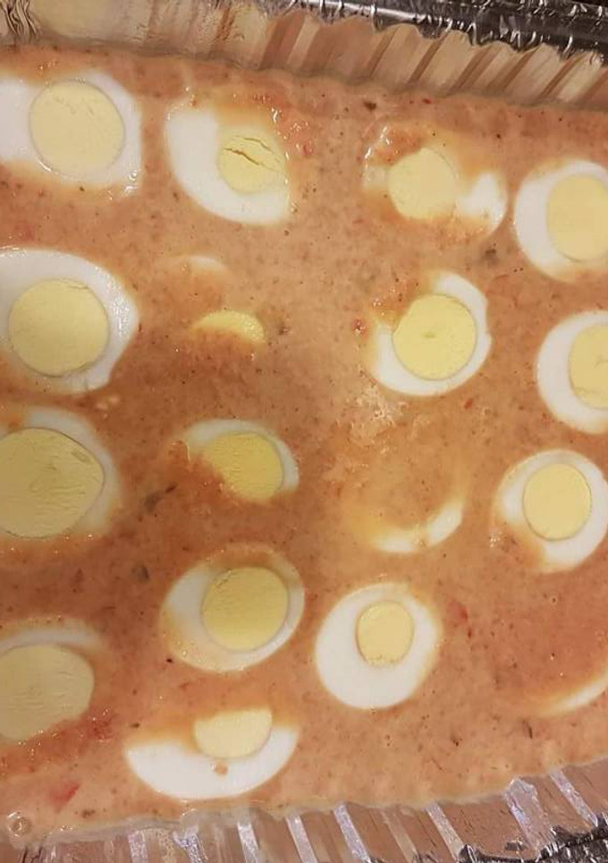 A picture of Moi moi with boiled egg.