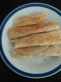 Tacos de pechuga deshebrada fritos