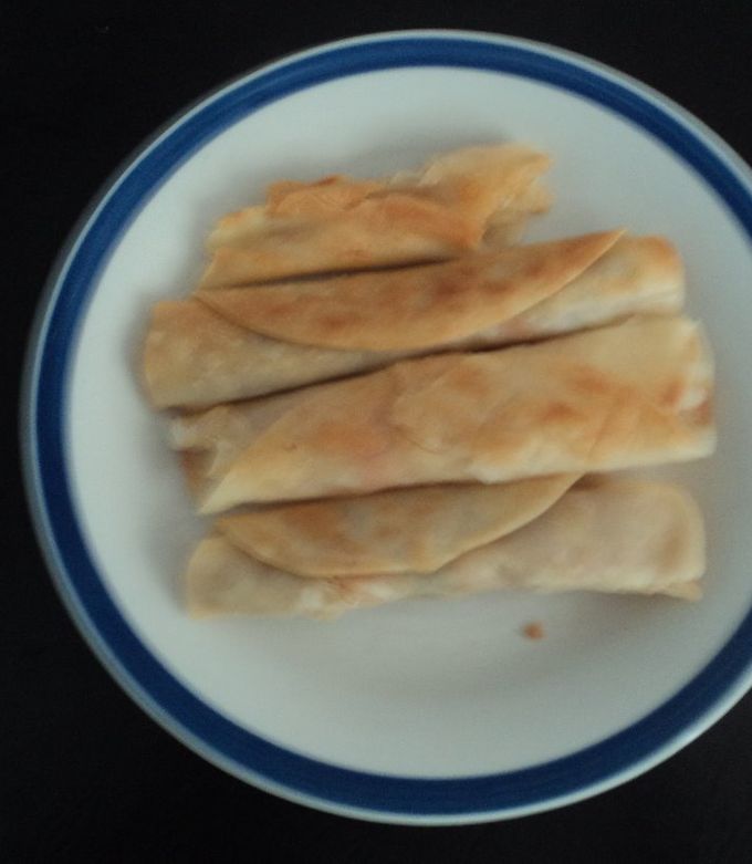 Una foto de Tacos de pechuga deshebrada fritos