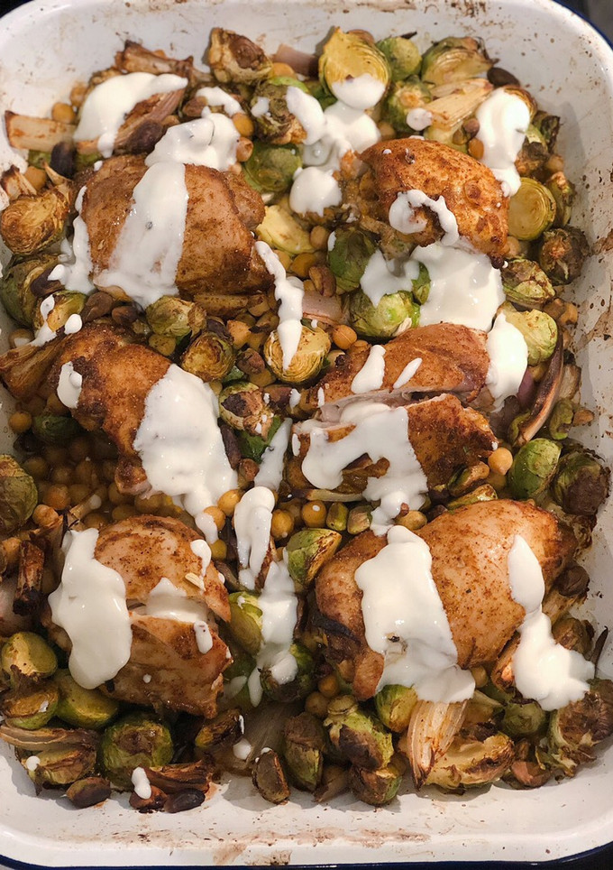 A picture of Curried chicken, sprouts and chickpeas with honey lemon yogurt.