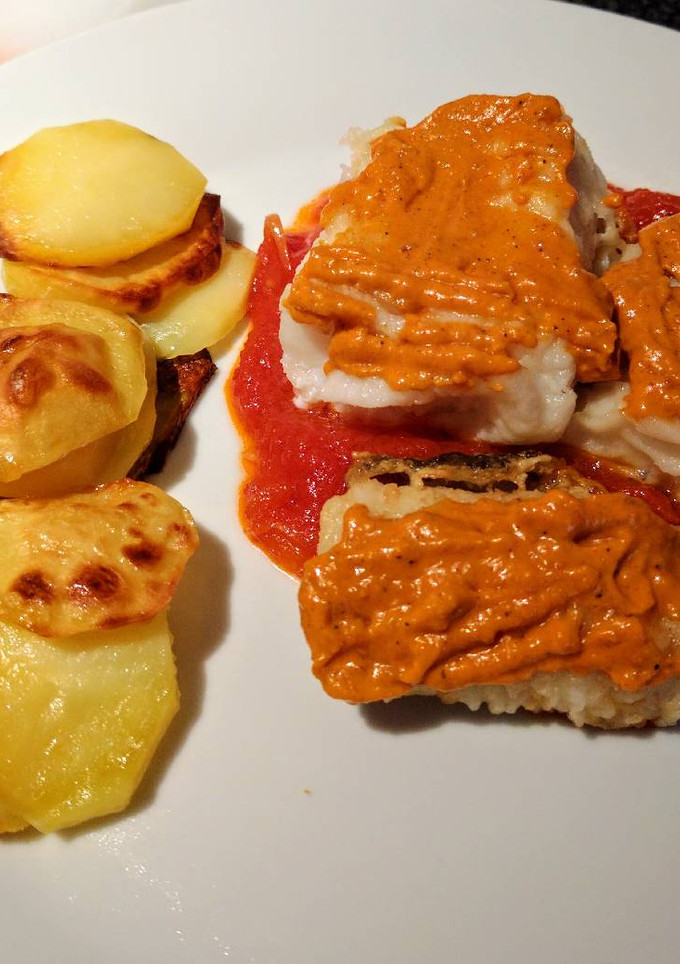 Una foto de Bacalao al romesco