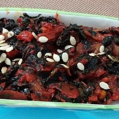 A picture of Red Coloured Leafy vegetables.