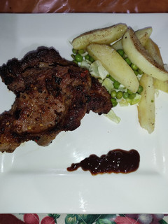 A picture of Rib Eye Beef Steak in Barbecue Sauce.