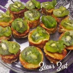 A picture of Baked Mini Kiwi Cheesecake Cups.