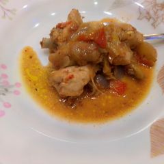 A picture of Chicken and veggies stir fry.