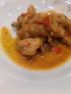 A picture of Chicken and veggies stir fry.