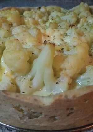 Una foto de Quiche de brócoli, espinaca y cebollas