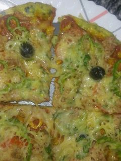 صورة لوصفة بيتزا بعجينة الكوسة 🍕😝