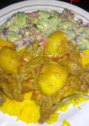A picture of Beef Biriani with guacamole.