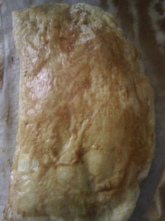 Una foto de Empanada de queso y beicon