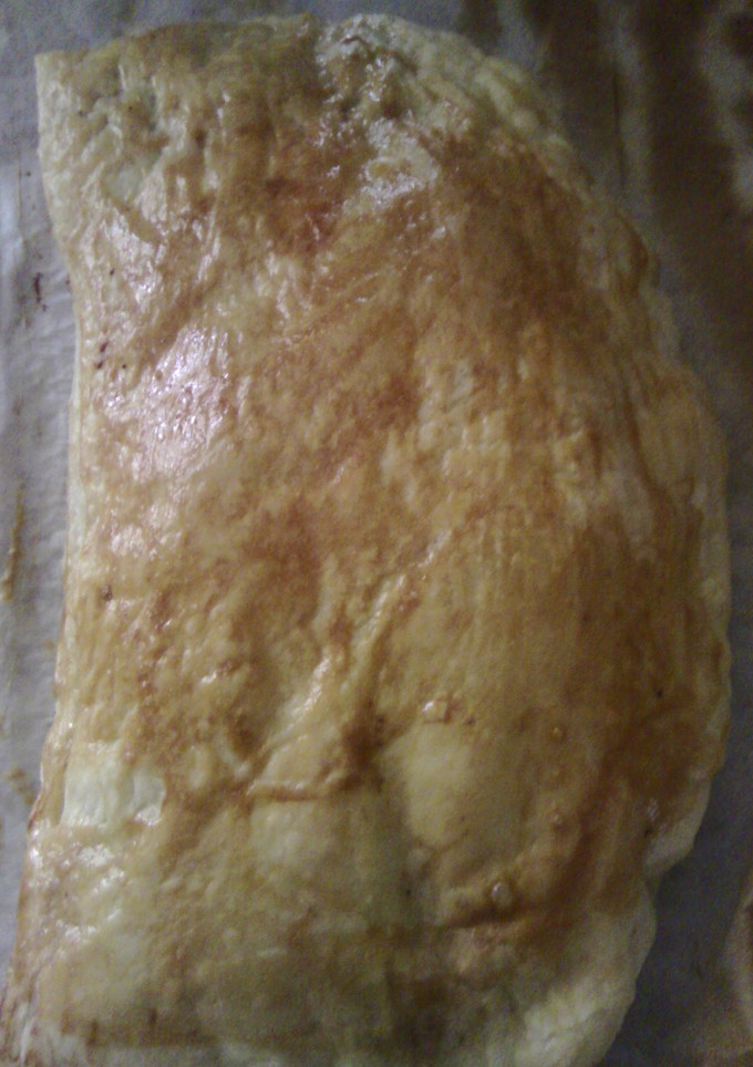 Una foto de Empanada de queso y beicon