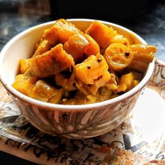 Raw bannana and ivy gourd dry gravy A picture of Raw bannana and ivy gourd dry gravy.