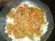 Una foto de pure de tomate con arroz